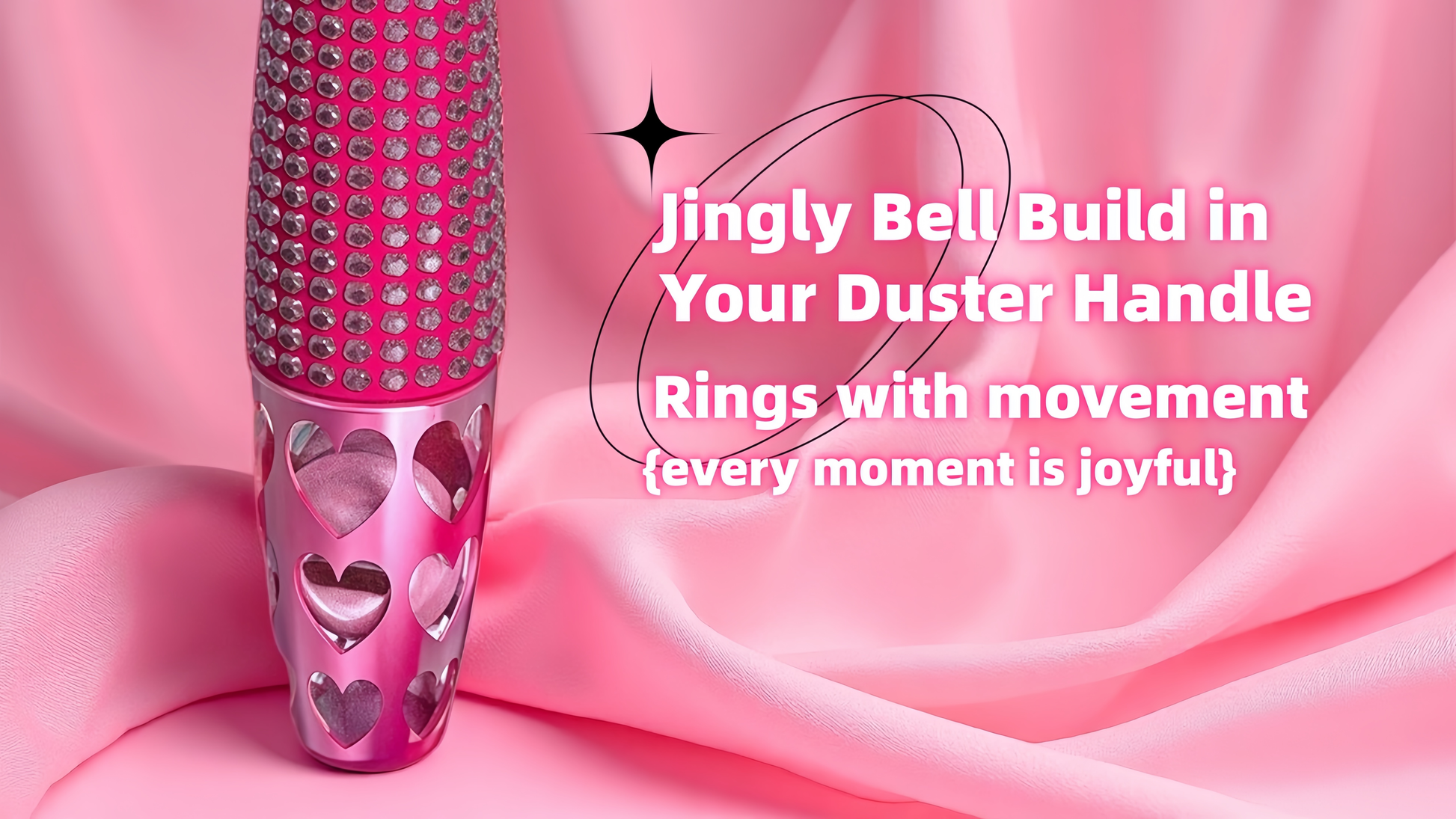 Pink duster handle with jingly bell design on a pink fabric background